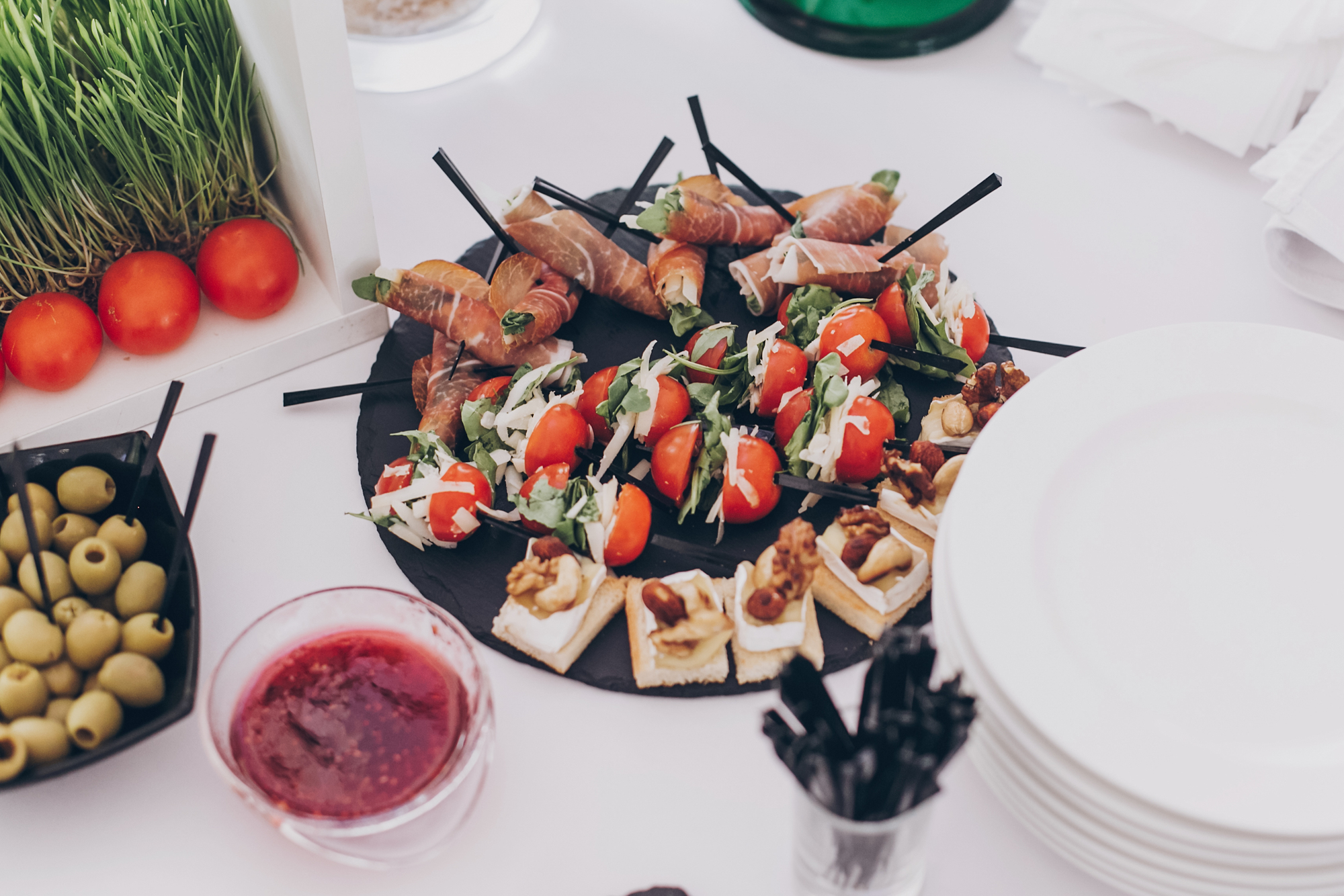 Delicious appetizer and canape on table at wedding reception in